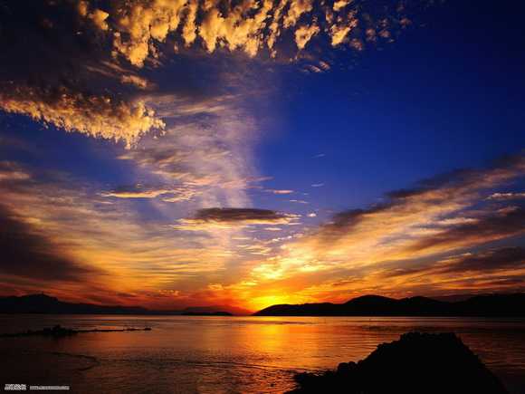 Photoshop将海边美女图片打造出梦幻的夕阳背景